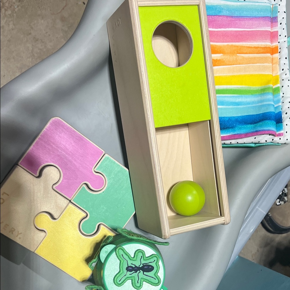 Lovevery lot: discovery book, ball box, velcro, bug cup, two sided puzzle